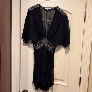 Forever 21 Black sheer high low  top with Silver Embellishments